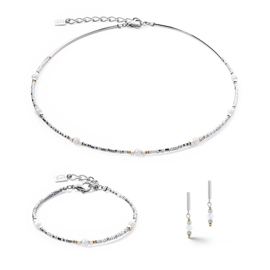Boucles d'oreilles Orbit perle d'eau douce argentée