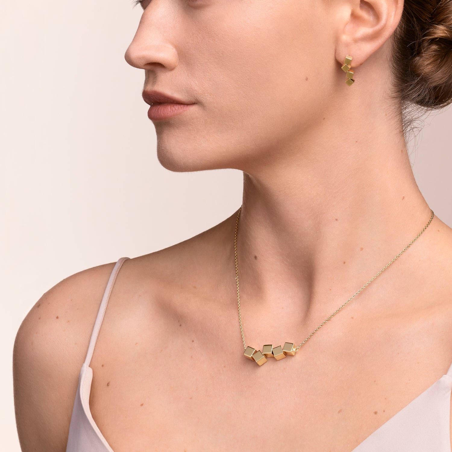 Collier Dancing GeoCUBE® acier or