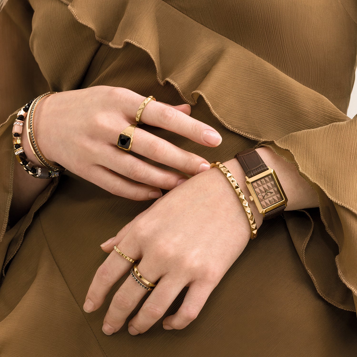 Montre Iconic Spikes bracelet cuir Mocha Mousse Or